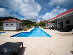 Grande villa avec piscine et jacuzzi, vue mer splendide, proche des plages de Grand Anse et de l'Anse Rodrigue, très calme, sans vis-à-vis